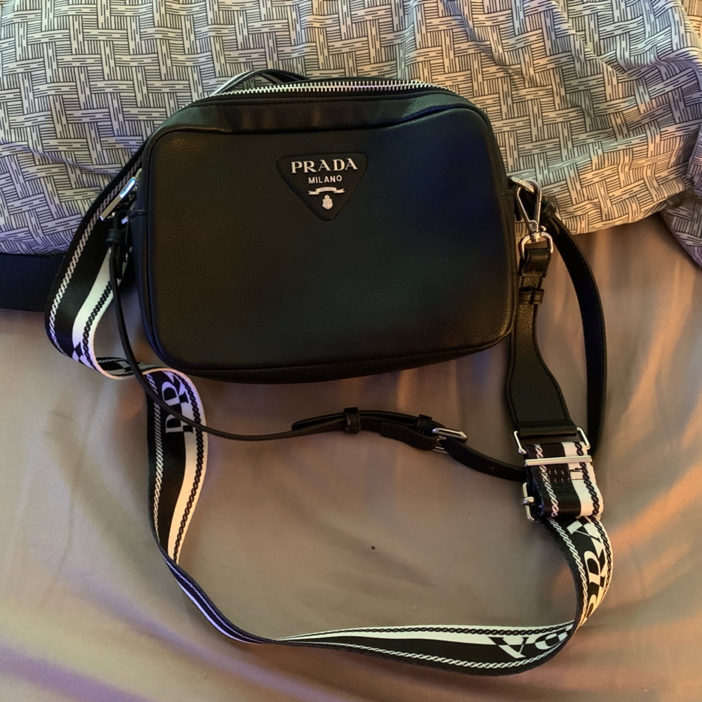 A new black crossbody bag brand new needs home